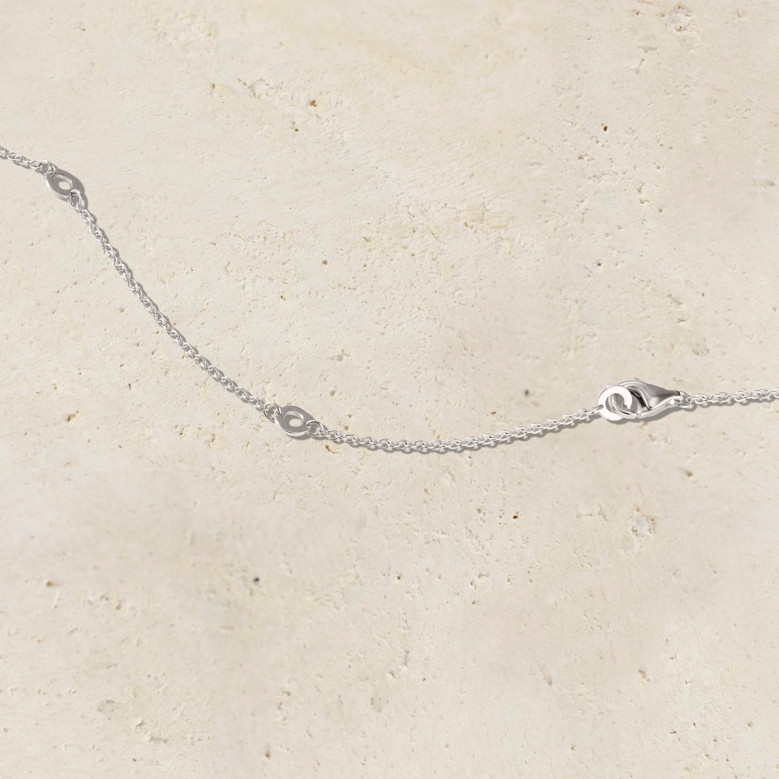 LHUNE 7 Diamond Graduated Necklace in white gold, clasp detail showing lobster closure and fine cable chain