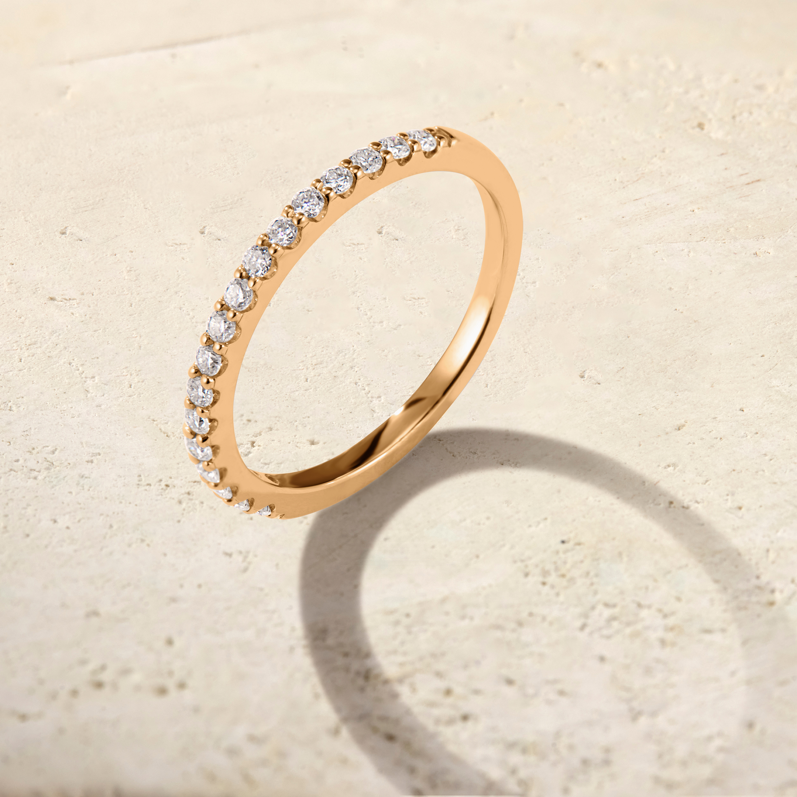 LHUNE Ciel Pavé Eternity Ring in yellow gold, angled tilted view highlighting pavé diamond half-eternity setting