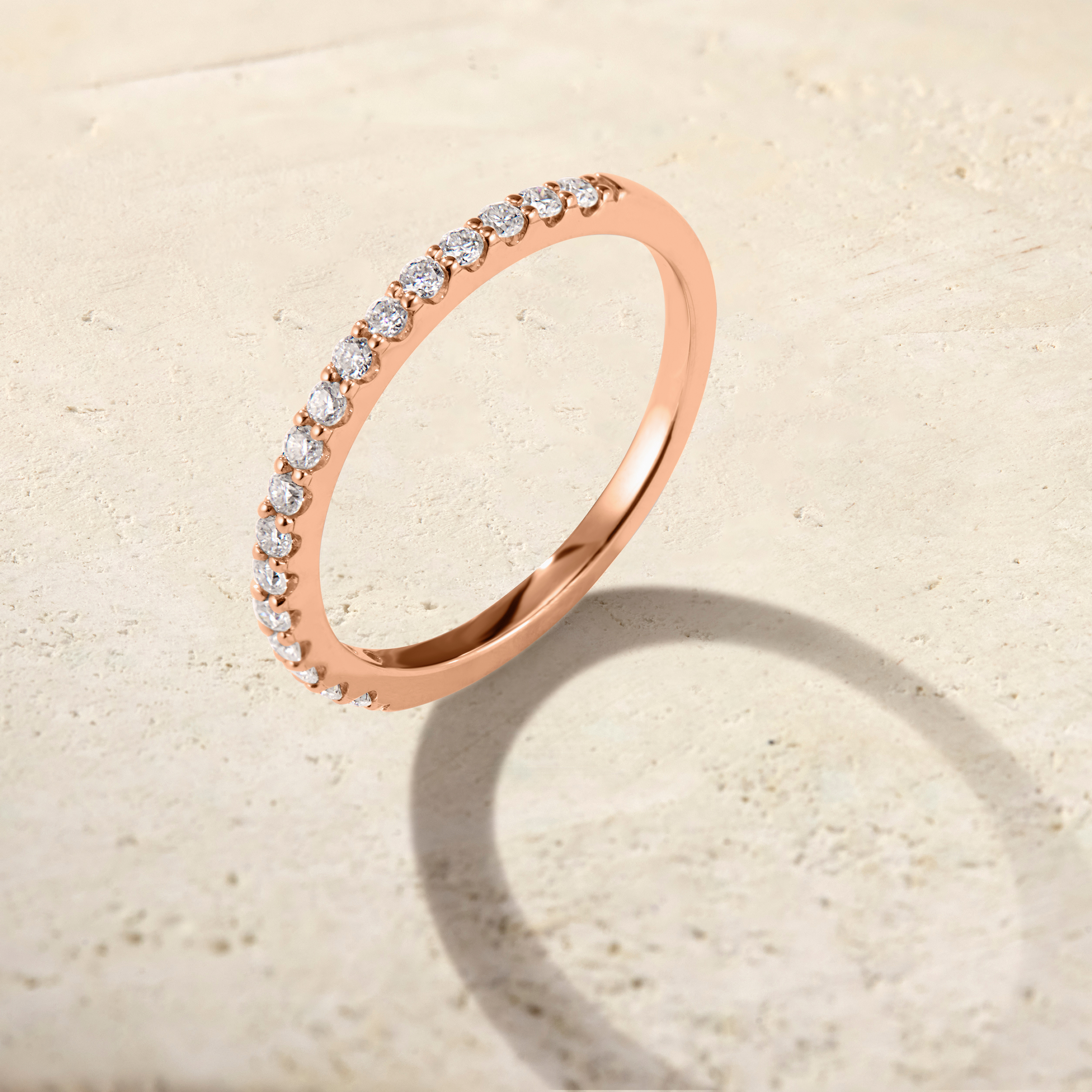 LHUNE Ciel Pavé Eternity Ring in rose gold, angled tilted view highlighting pavé diamond half-eternity setting