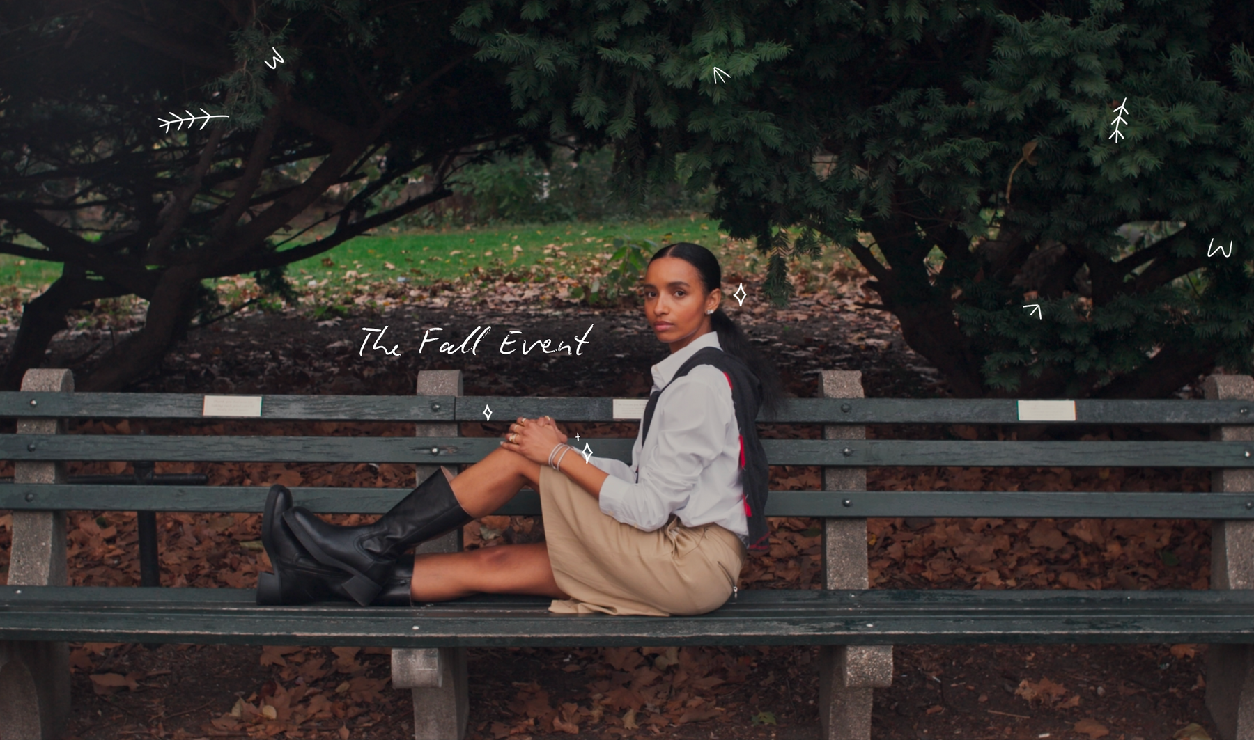 Person sitting on a bench in a park with 'The Fall Event' text overlay