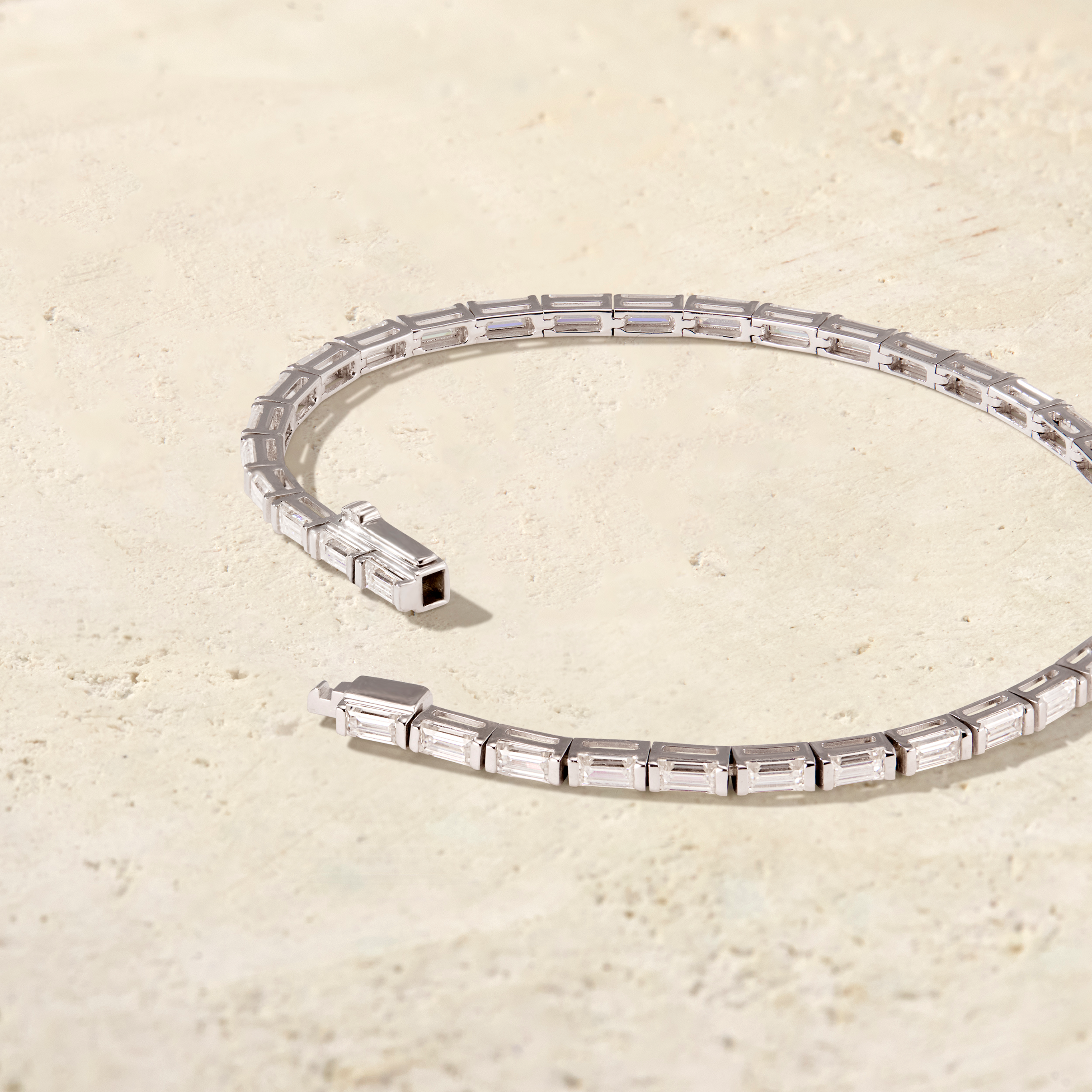 LHUNE Canella Baguette Tennis Bracelet in white gold, open clasp detail showing security mechanism