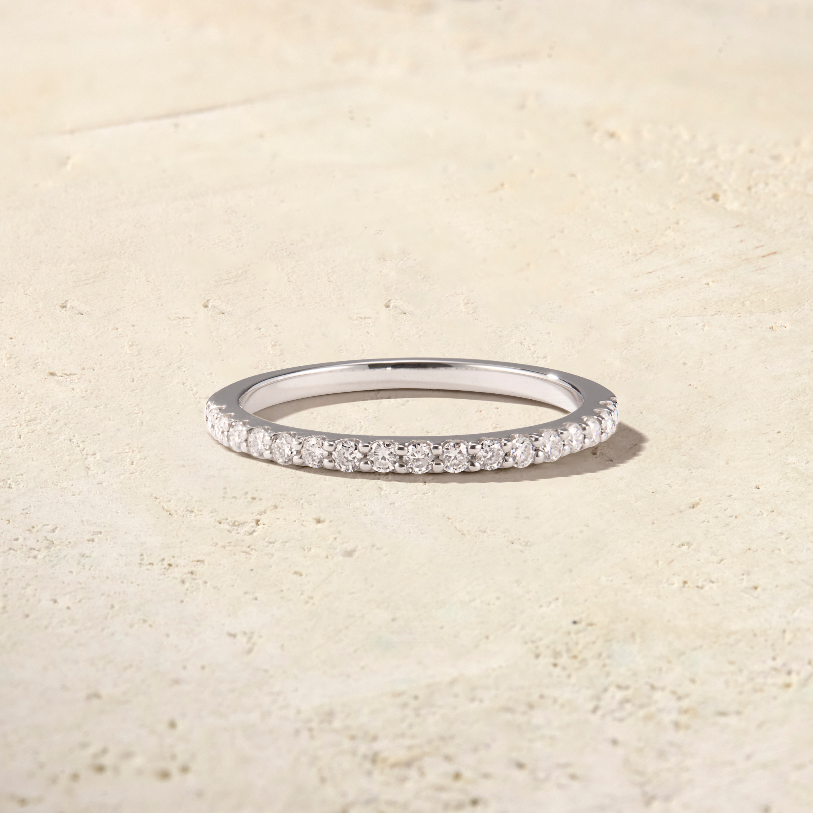 LHUNE Ciel Pavé Eternity Ring in white gold, front view of pavé round brilliant diamonds on half-eternity band